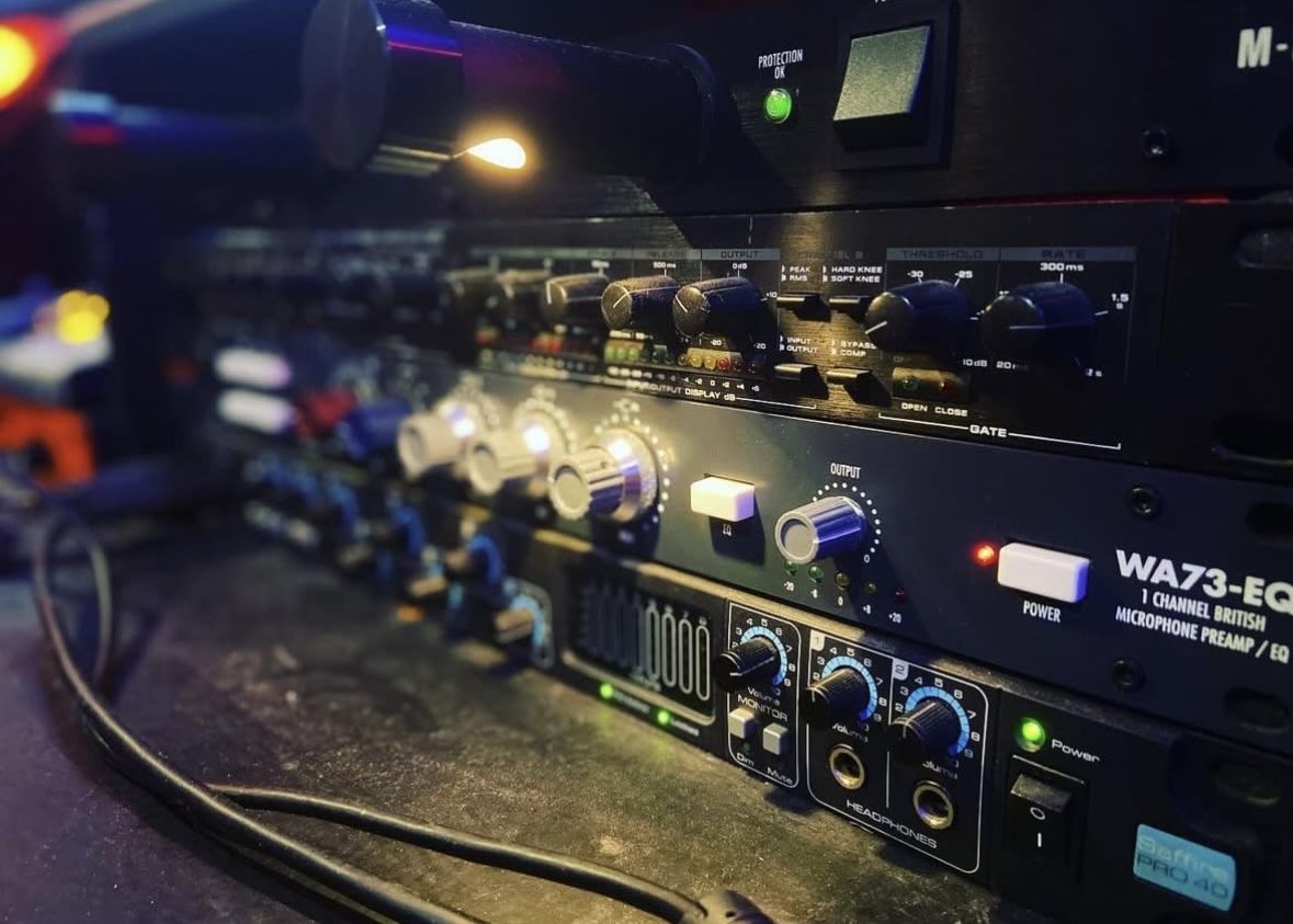 Close-up of professional microphone preamp and audio rack equipment at Sound Twist Studios